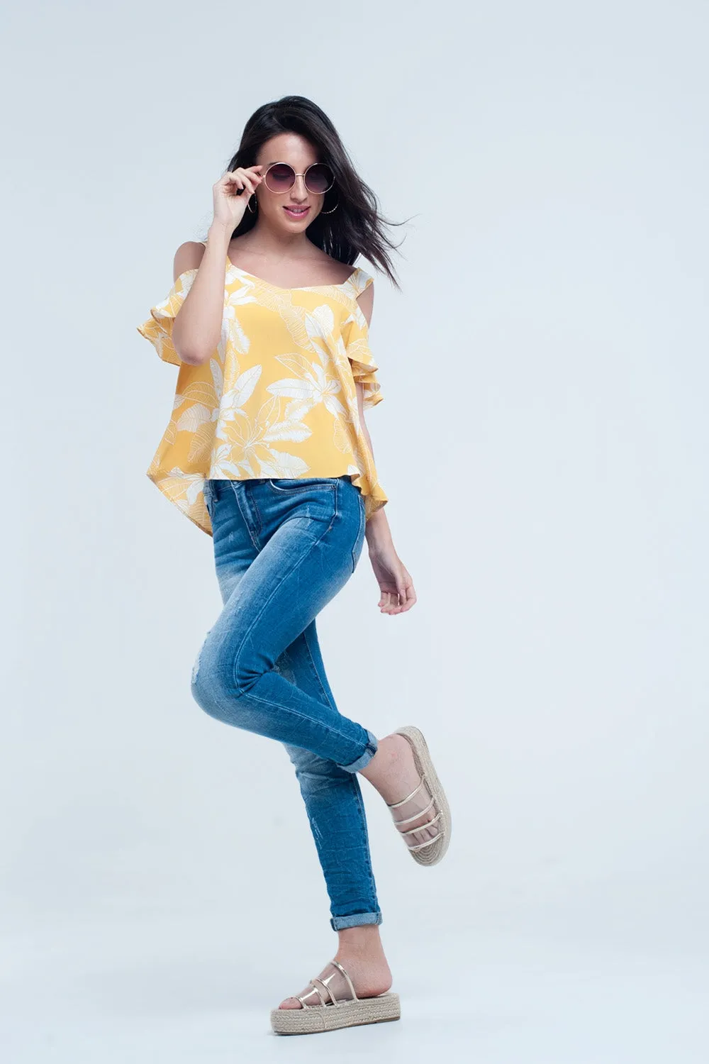 Yellow flower top and ruffles detail